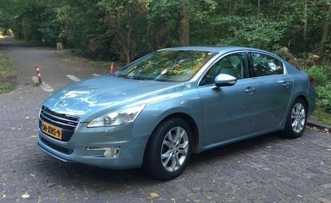 peugeot-508-hybrid-4-blue-front-side